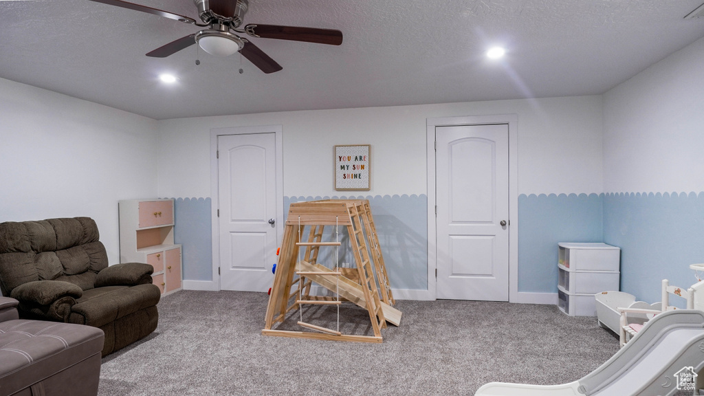 Game room with carpet floors, ceiling fan, and recessed lighting