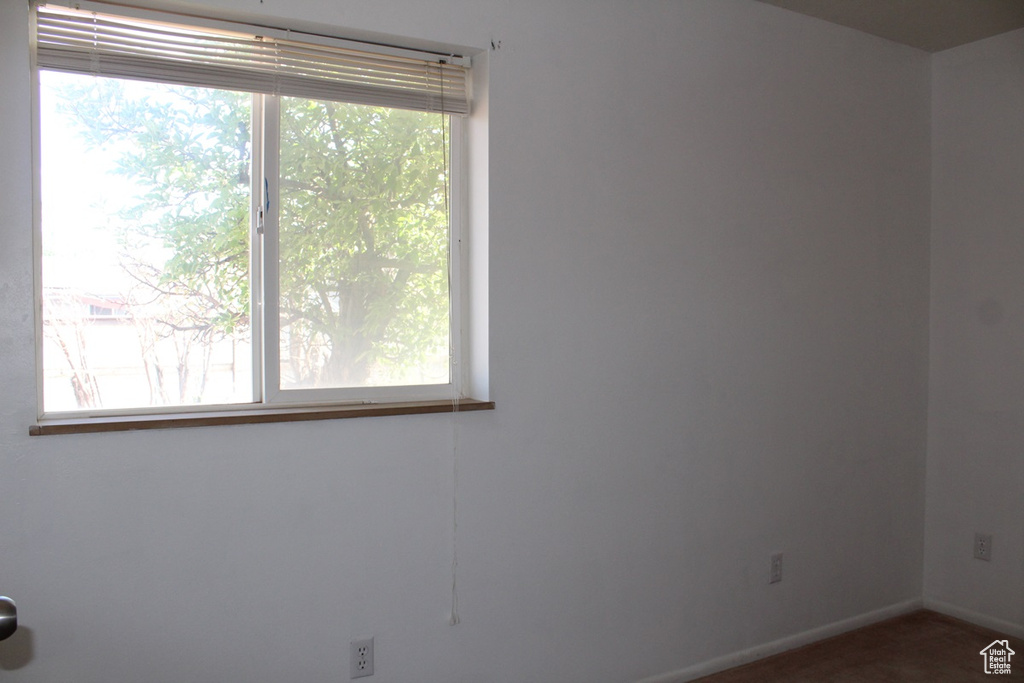 Empty room with baseboards