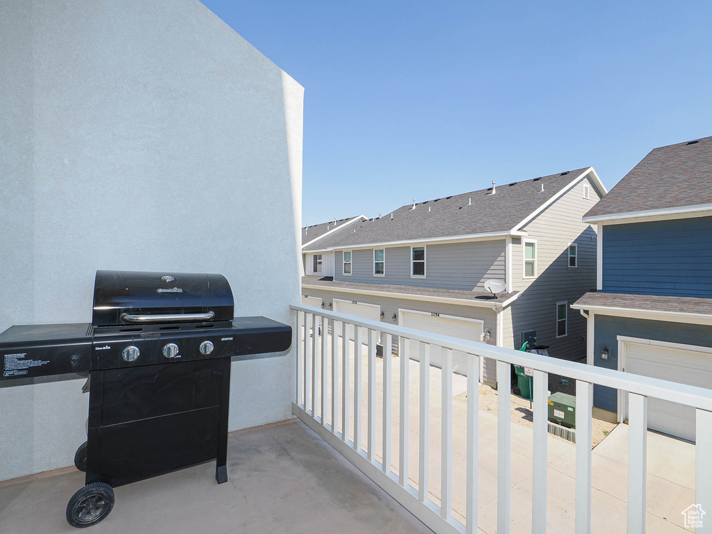 Balcony featuring area for grilling