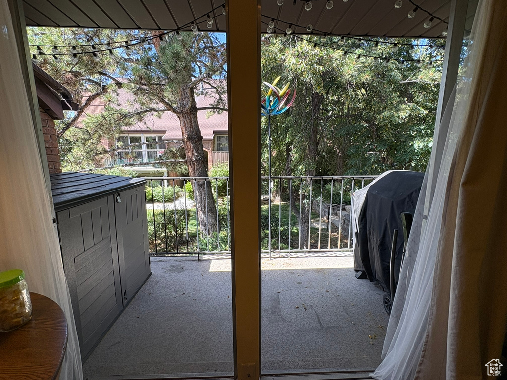 Balcony featuring area for grilling