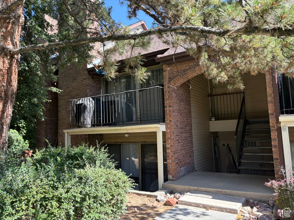 View of building exterior featuring stairs