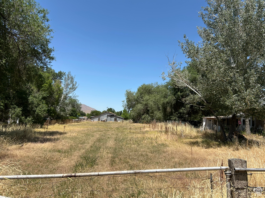 View of yard featuring a view of rural / pastoral area