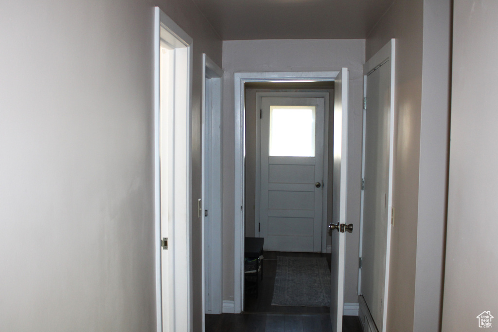 Corridor featuring baseboards