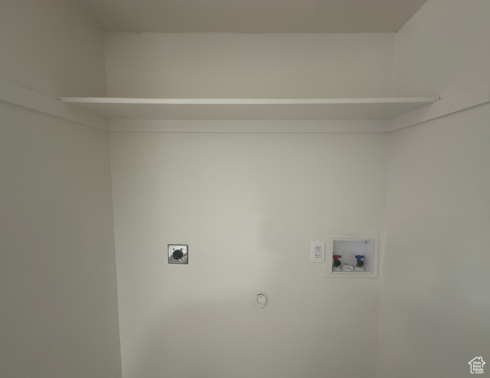 Laundry room with hookup for an electric dryer and washer hookup