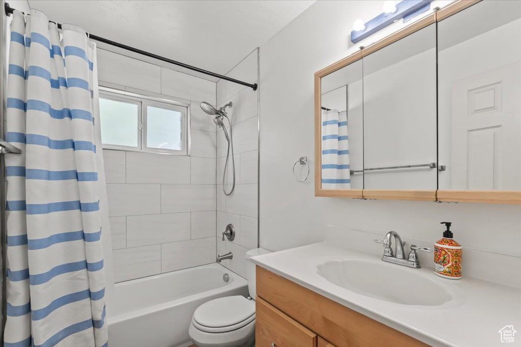 Full bath with vanity and shower / bathtub combination with curtain