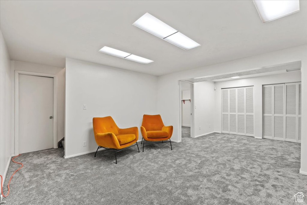 Living area with carpet flooring