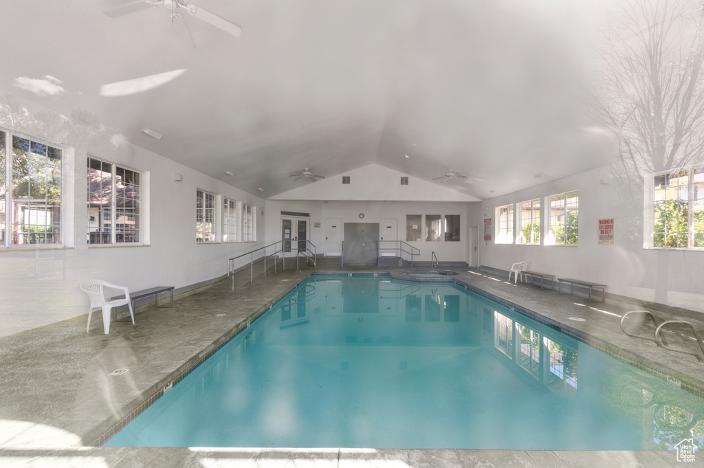 Indoor community pool with a ceiling fan