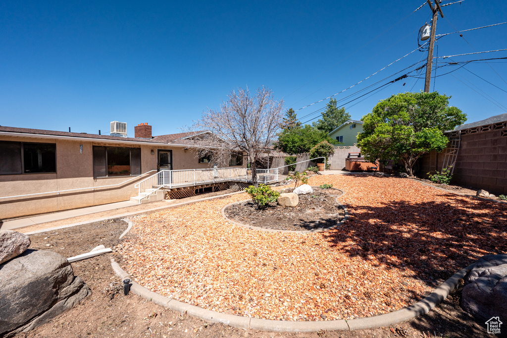 View of fenced backyard