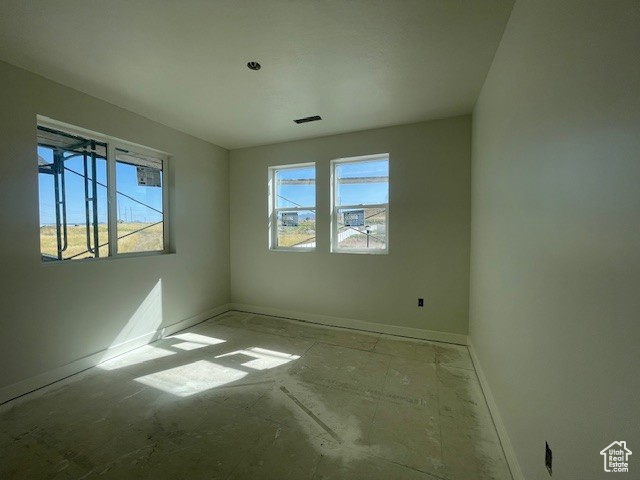 Spare room with baseboards