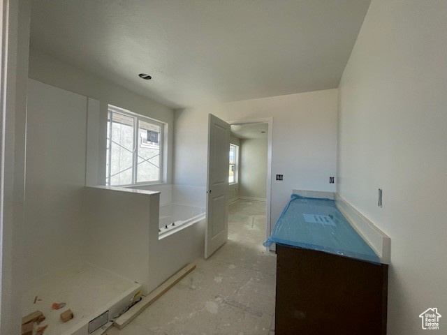 Full bathroom with a bath