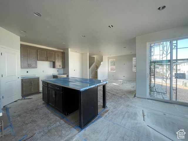 Kitchen with open floor plan and a center island