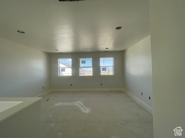 Spare room with baseboards