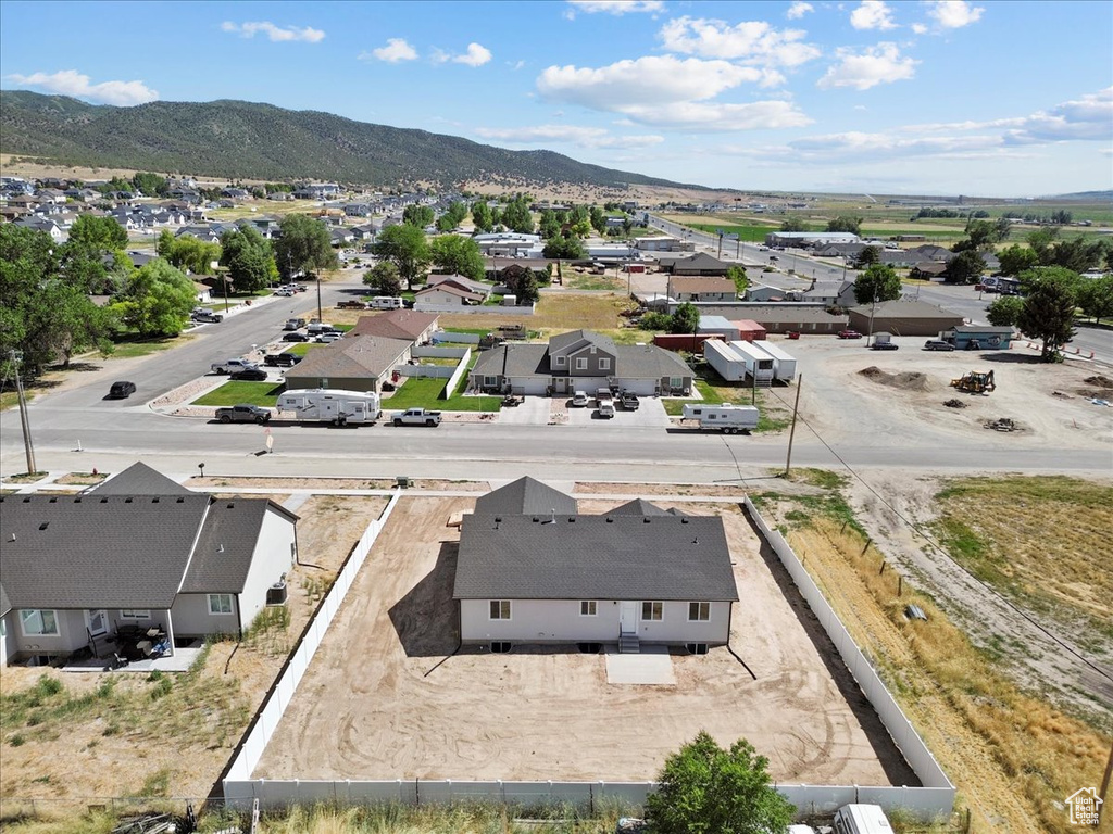 Aerial view of residential area with a mountain backdrop