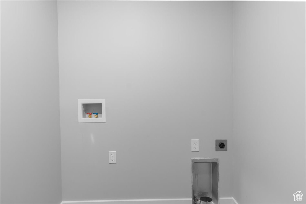 Laundry room featuring hookup for an electric dryer and washer hookup