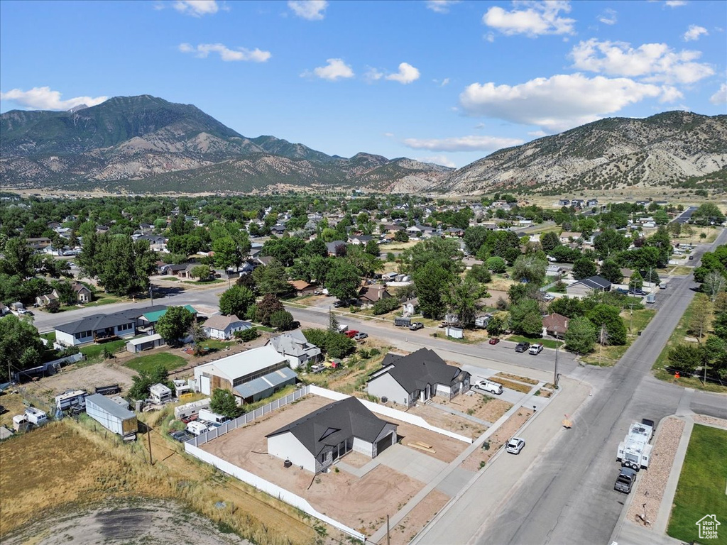 Aerial view of residential area featuring mountains