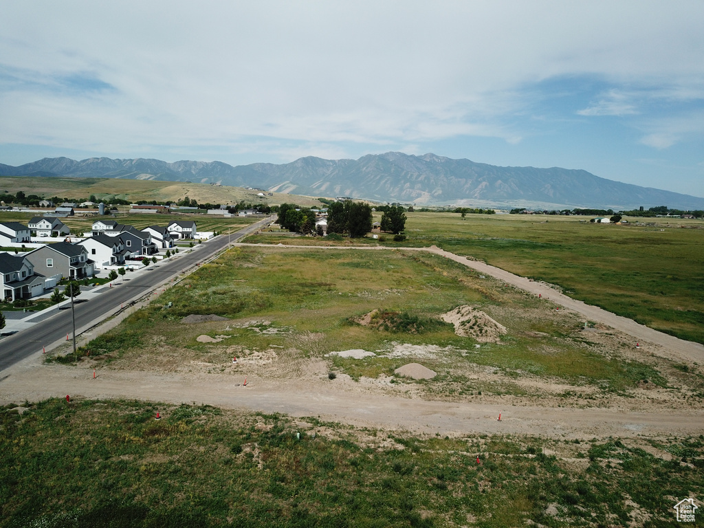 View of mountain backdrop with nearby suburban area