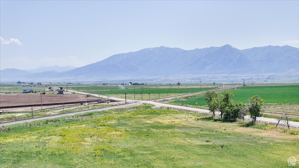 View of mountain backdrop featuring rural landscape