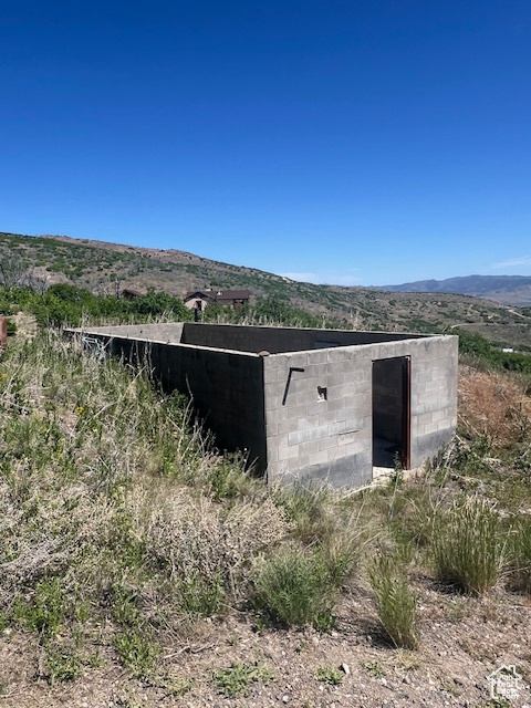 View of outdoor structure featuring a mountain view