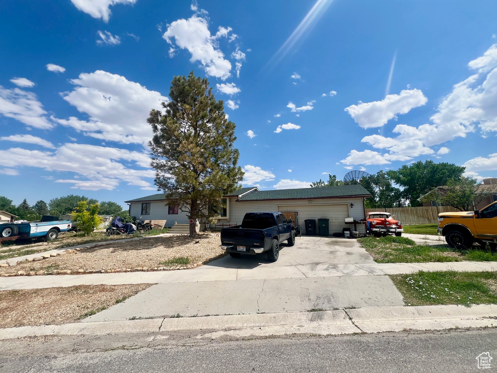 Single story home with an attached garage and driveway