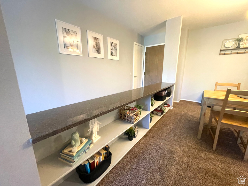 View of carpeted dining space