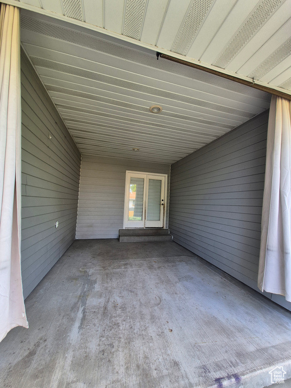 View of patio featuring a carport