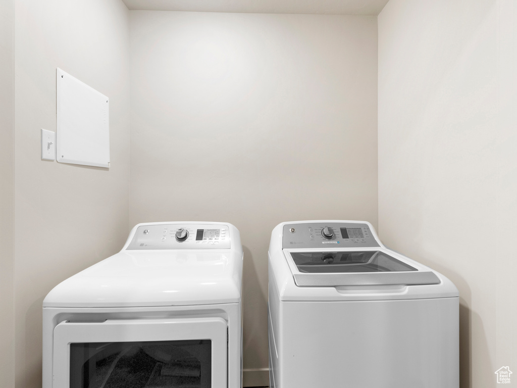 Laundry room featuring independent washer and dryer