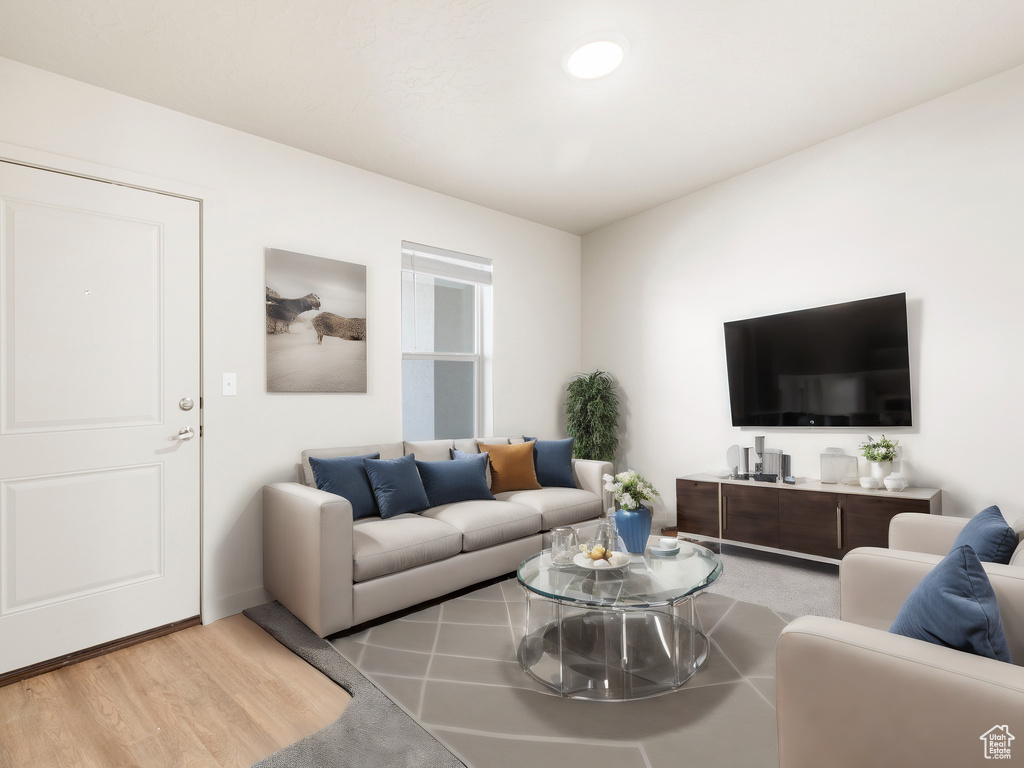 Living area with light wood-style floors