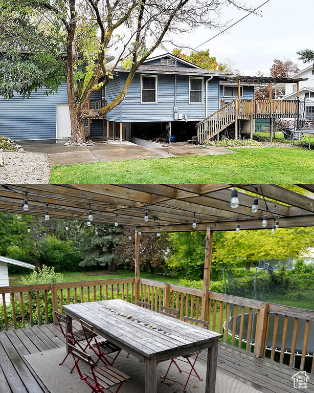 Wooden terrace featuring a pergola and a lawn
