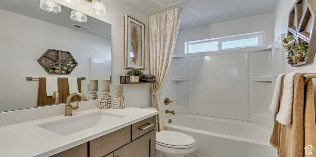 Full bath with vanity and shower / bathtub combination