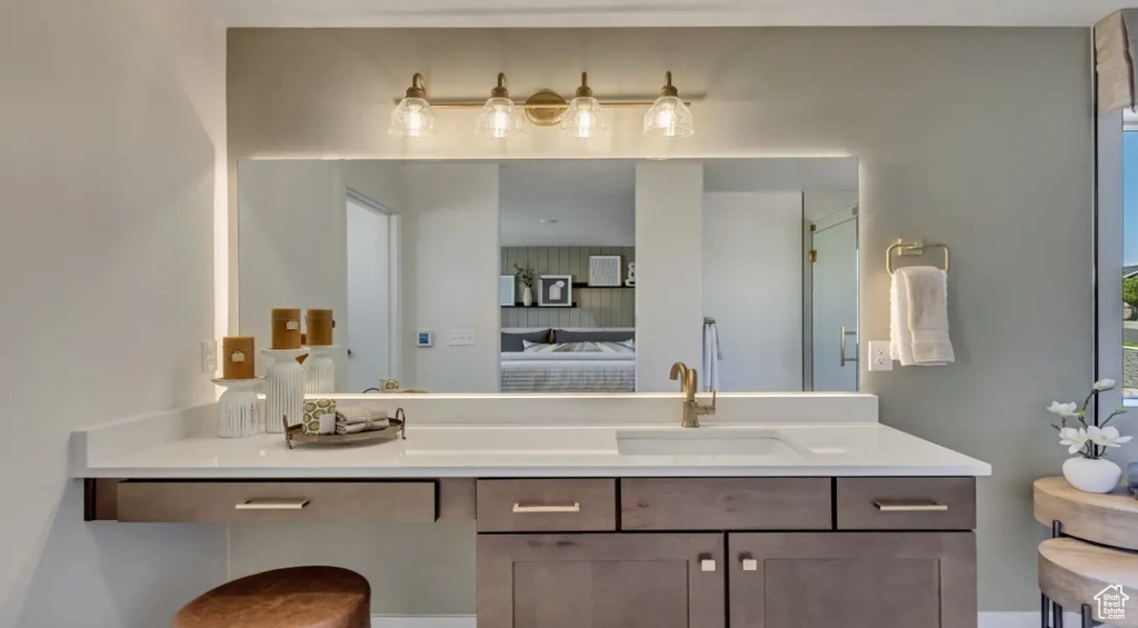 Bathroom with connected bathroom and vanity