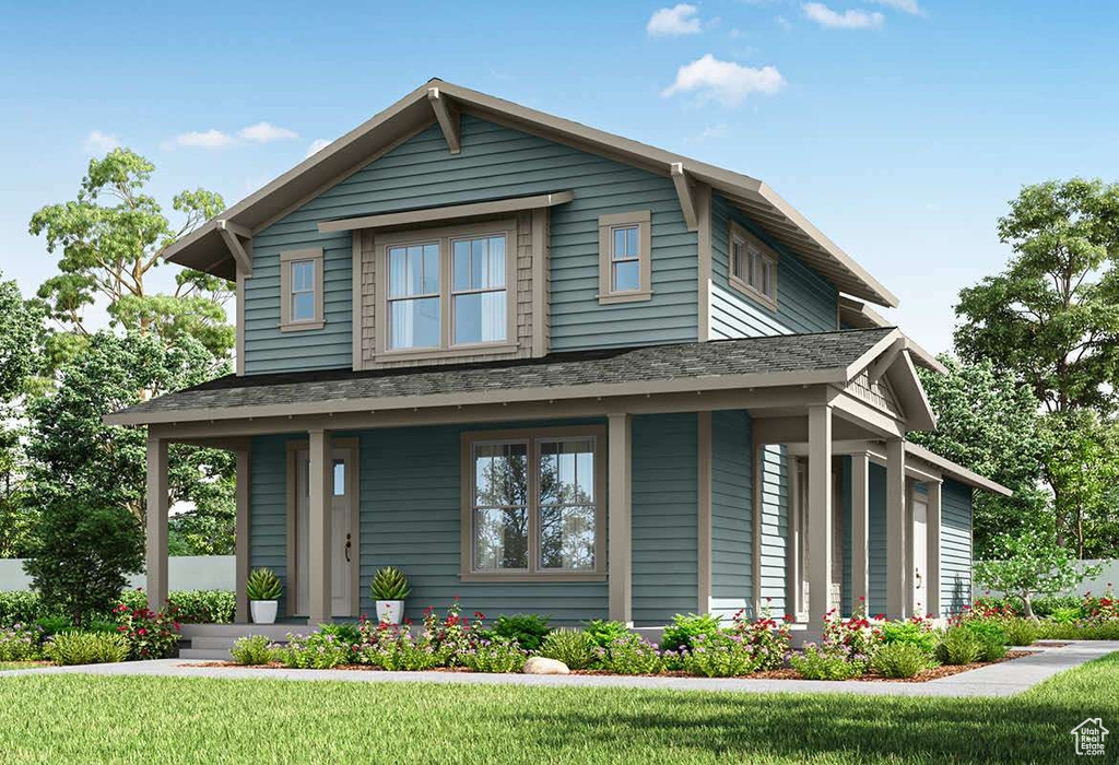 View of front of home with a porch, a front yard, and roof with shingles