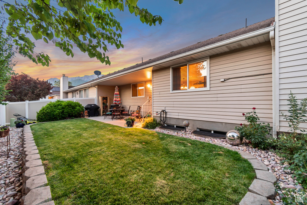 Rear view of property with a patio area