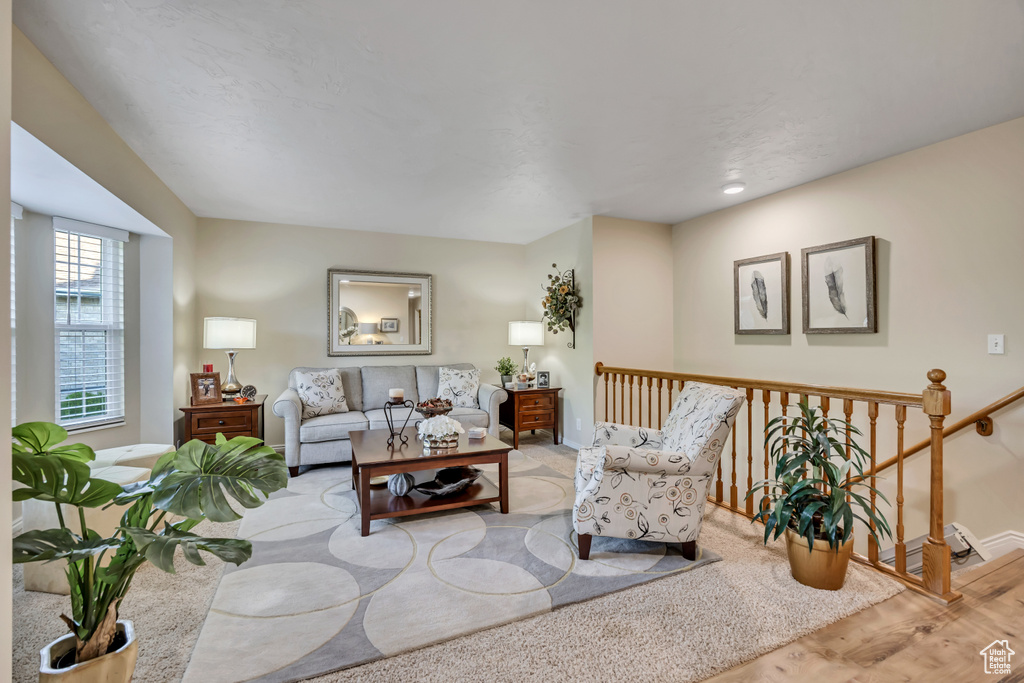 Living room featuring wood finished floors and baseboards