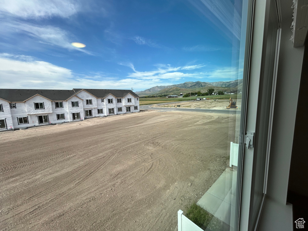 View of building exterior featuring a mountain view