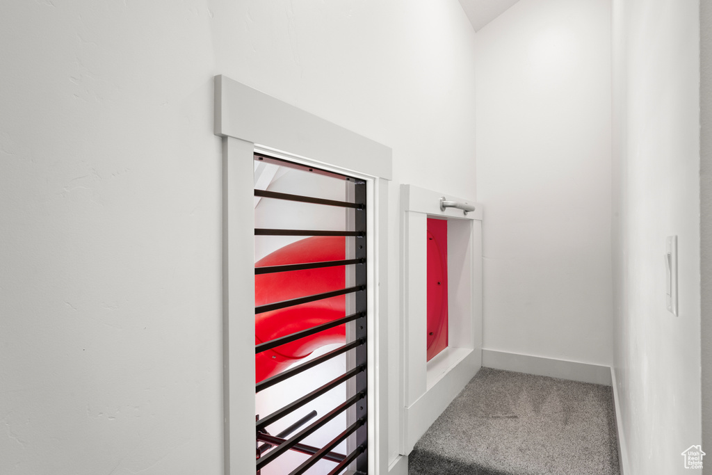 Detailed view of carpet floors and baseboards