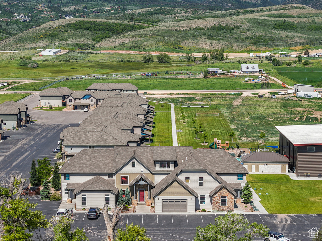 View of subject property featuring mountains