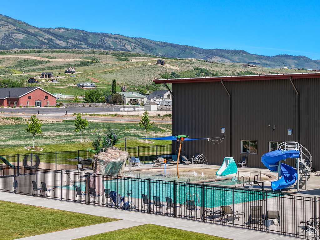 View of pool featuring a mountain view