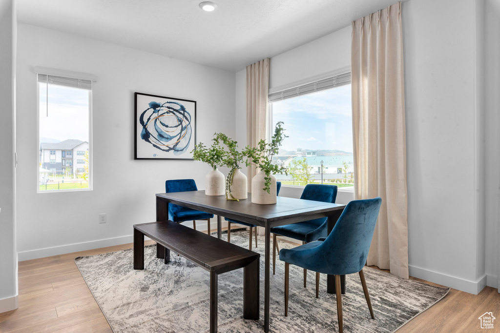 Dining room with light wood-style floors