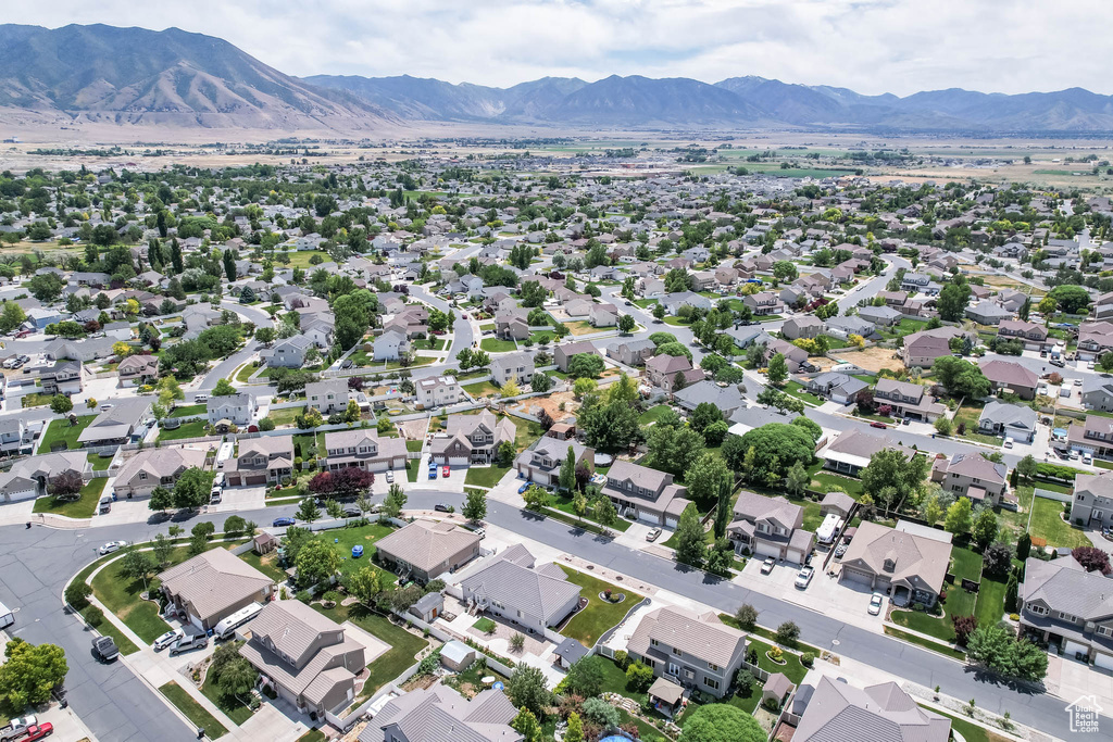 Aerial overview of property's location with nearby suburban area