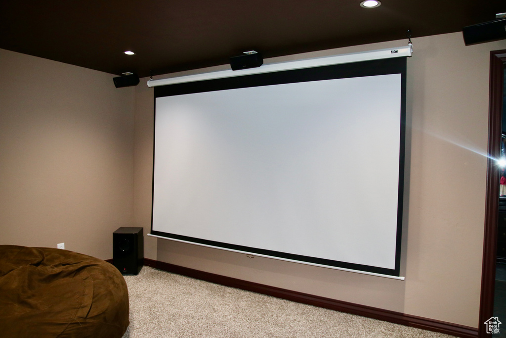 Cinema with light carpet and recessed lighting