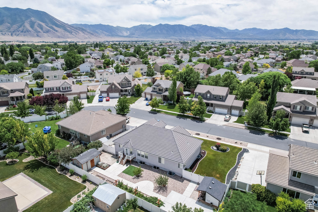 Aerial view of residential area with mountains