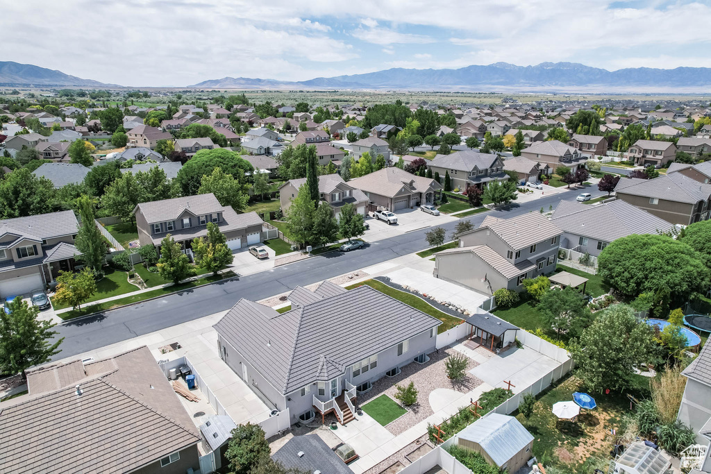 Aerial view of residential area with a mountainous background