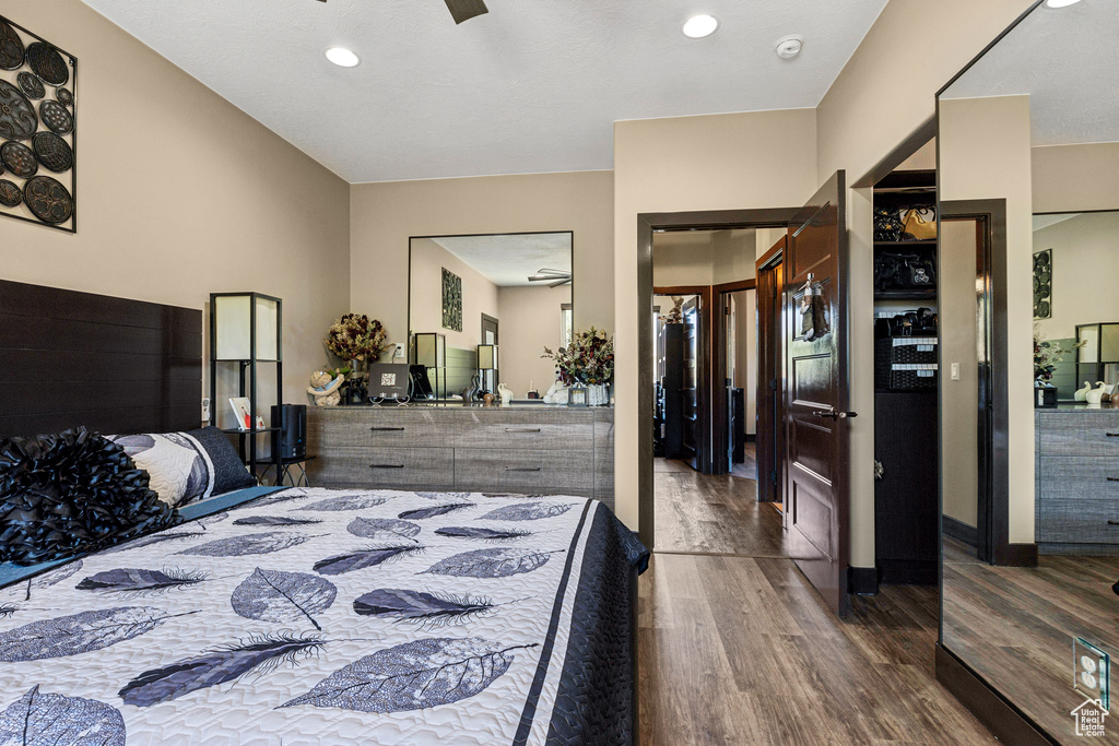 Bedroom featuring wood finished floors and recessed lighting