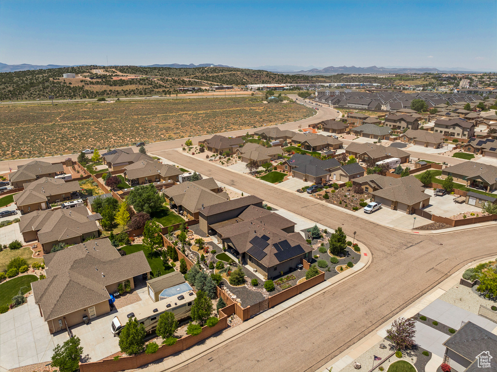 View of property location with nearby suburban area and mountains