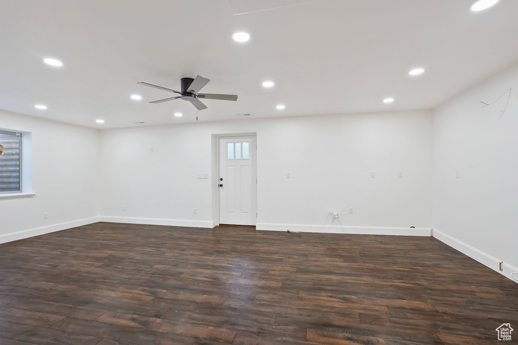 Spare room featuring recessed lighting, dark wood-style floors, and a ceiling fan