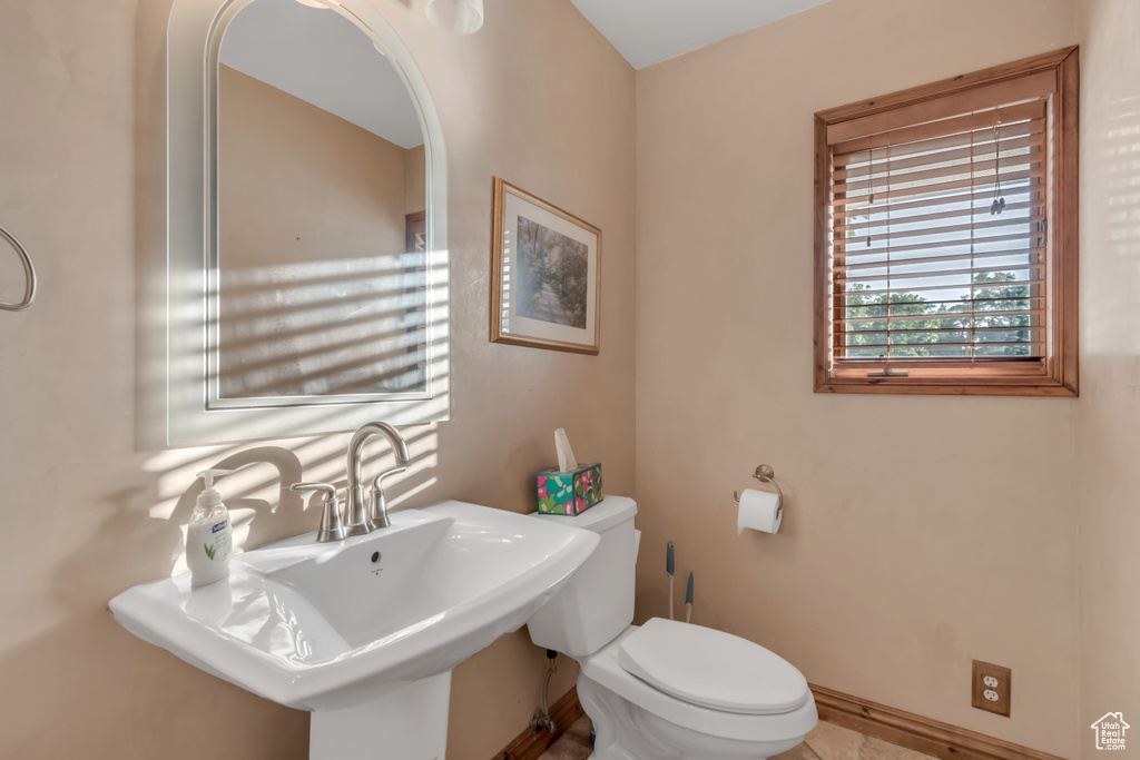 Bathroom featuring toilet and a sink