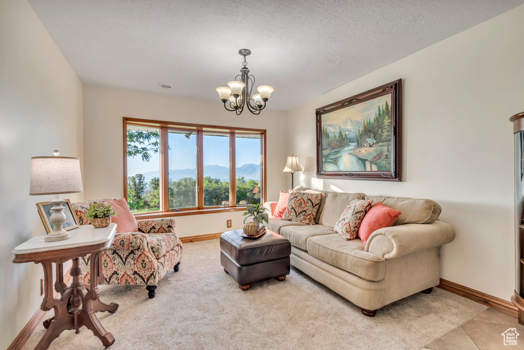 Living area with a chandelier and a mountain view