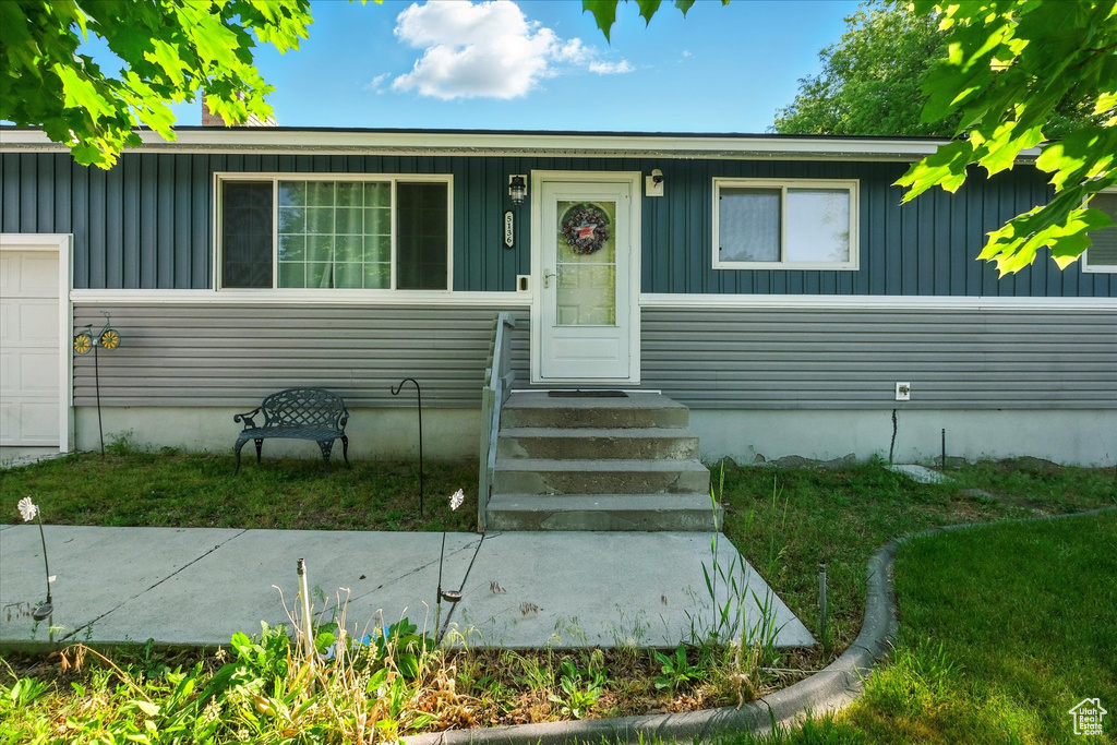 View of front of home with board and batten siding