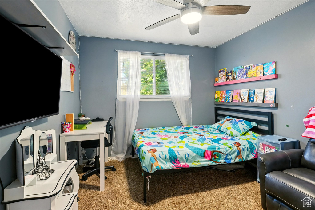 Bedroom with carpet floors and ceiling fan
