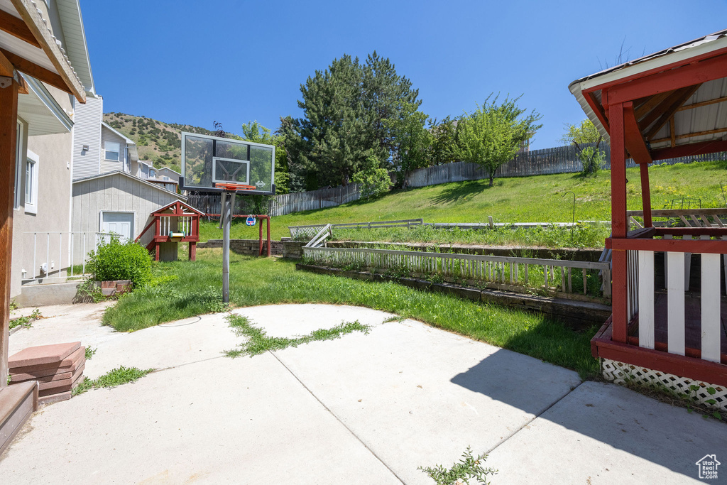 Fenced backyard featuring a patio area